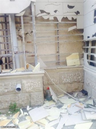 Abutalıbovun başına yanan binadan şüşə düşdü