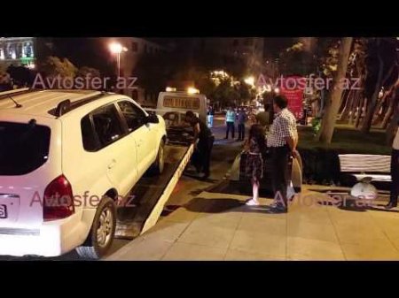 Bakıda evakuasiya şousu: Sürücü yanında ola-ola maşını zorla apardılar