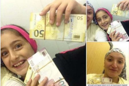 Qadın avtobus dayanacağından 25 min manat tapdı