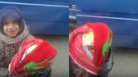 Bakıda uşaq südəmər körpə ilə diləndirilir