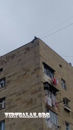 Yasamalda tikinti özbaşınalığı: məmurlar gəldi, Ruslan özünü damdan atası olmadı