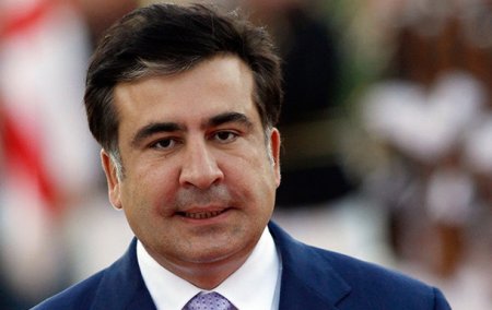 Saakaşvilinin sürücüsünü amansızcasına döydülər