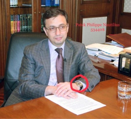 Milyonlarla dollar dövlət məmurunun... qolunda